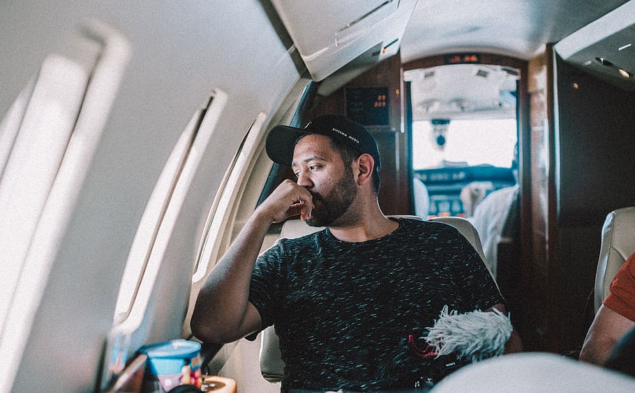 man sitting inside airplane, beard, pilot, camera, hat, art, candid HD wallpaper