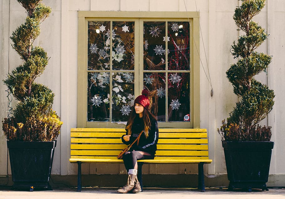 Woman Sitting on Yellow Bench, bonnet, christmas decor, daylight HD wallpaper