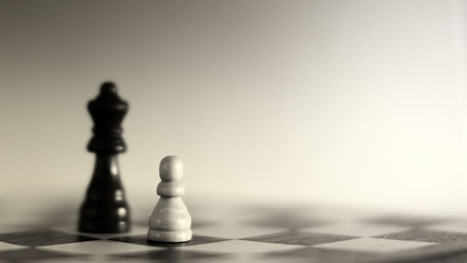 Grayscale Photography of Two Chess Pieces, black and white, blurred background