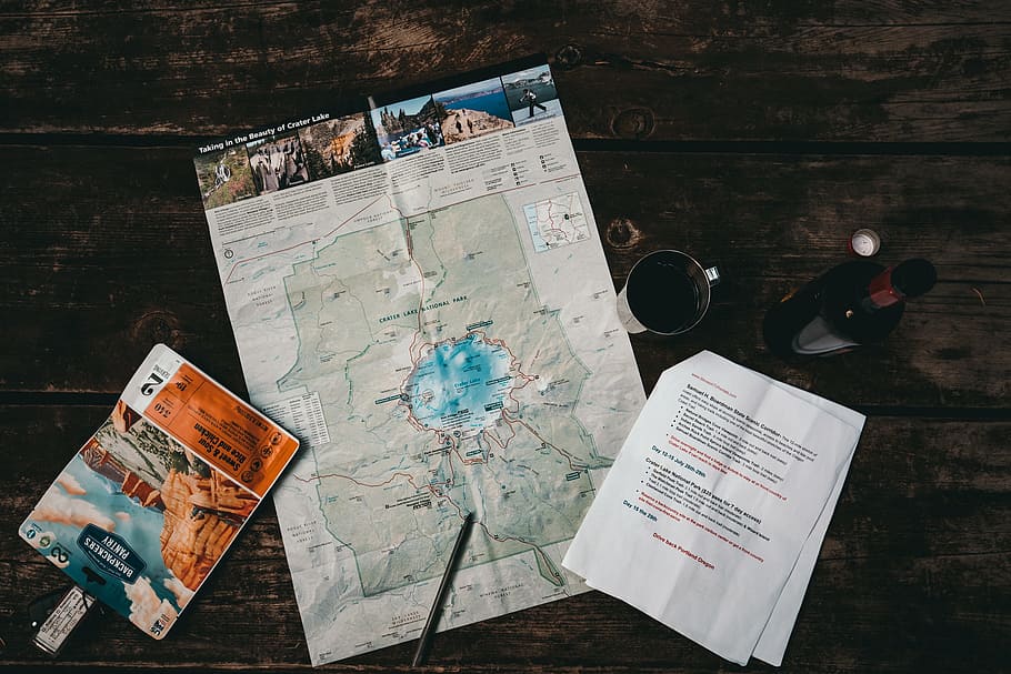 white map near mug, table, wine, pen, cup, backpacking food, dark HD wallpaper
