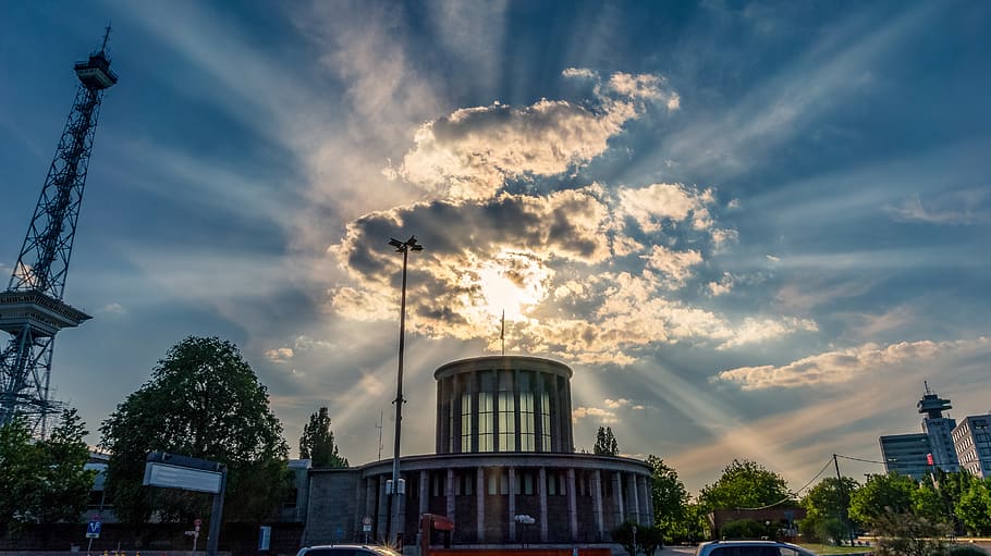 sky, clouds, sunbeam, rays, dramatic, bright, mood, built structure HD wallpaper