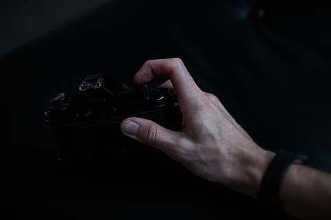 person holding black camera, human, video gaming, finger, electronics HD wallpaper