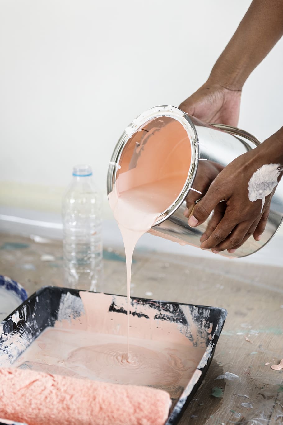 Person Holding Stainless Steel Bucket of Pink Paint Pouring on Paint Roller Bucket, HD wallpaper