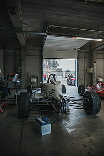 white vehicle inside building, wheel, machine, car, automobile HD wallpaper