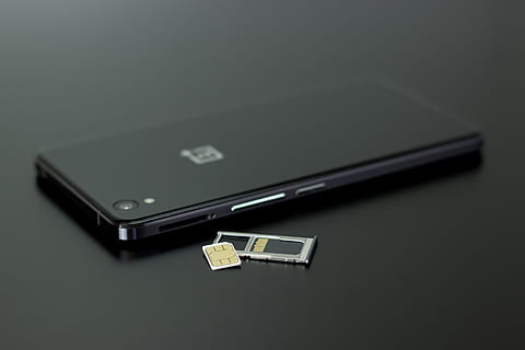 Black Smartphone on Black Table Top, communication, memory card HD wallpaper