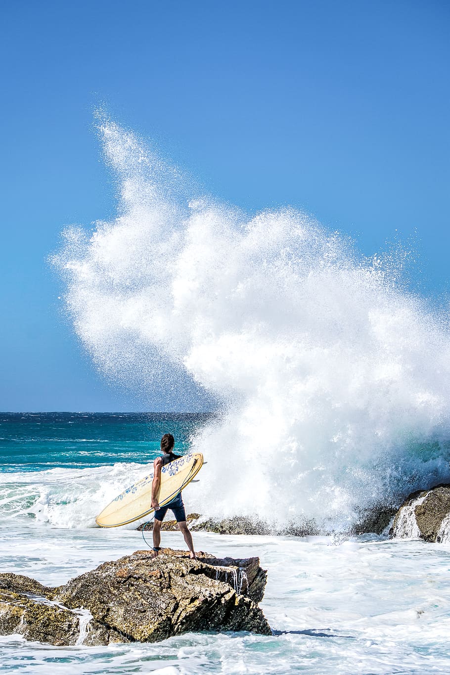 Person Holding Surfboard Standing On Rock , beach, leisure, man HD wallpaper