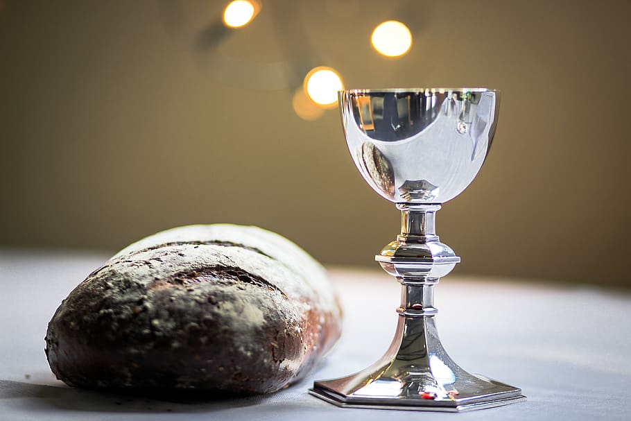 gray stainless steel chalice and bread bun, goblet, glass, new zealand