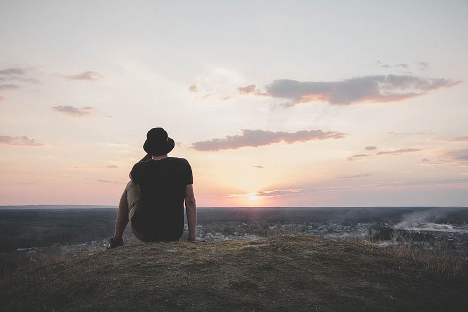 Person Sitting at Shoreline, 35mm, cliff, clouds, dusk, evening HD wallpaper