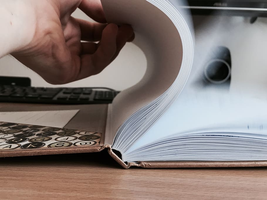 rolling pages, hand, book, human hand, human body part, one person HD wallpaper