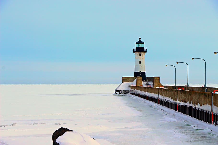 snow covered lighthouse, sky, built structure, water, nature HD wallpaper