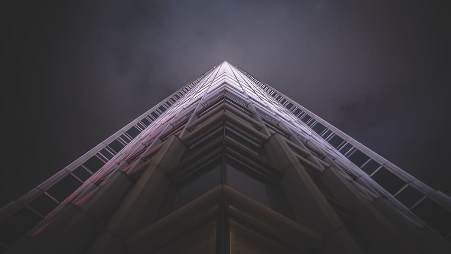 low-angle photography of white high-rise state of the art building HD wallpaper