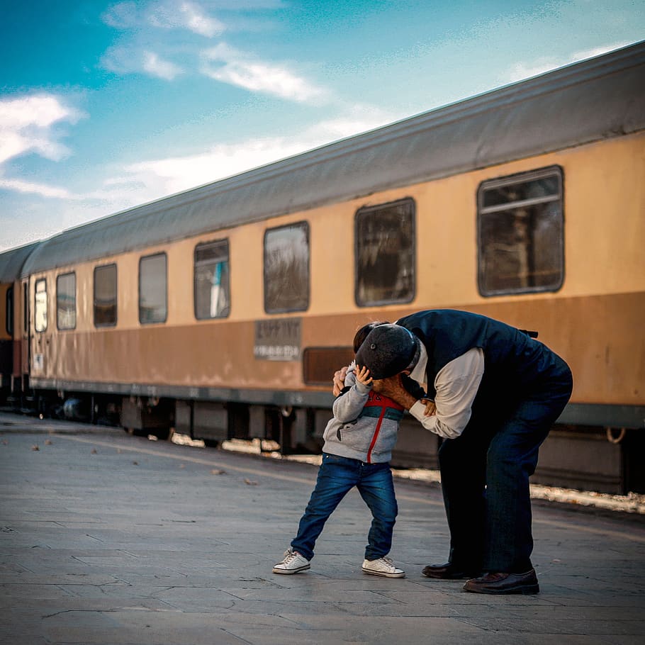 man and boy playing beside train, shoe, apparel, footwear, clothing HD wallpaper
