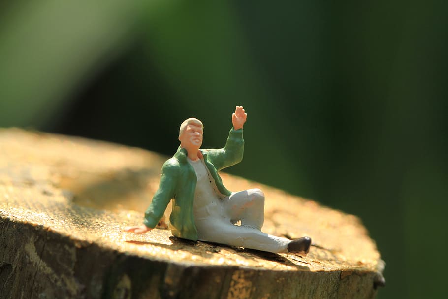 toy, figure, object, man, waving, one person, sunlight, sitting HD wallpaper