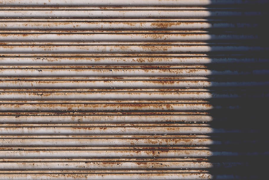 brown roller shutter, pattern, metal, backgrounds, no people