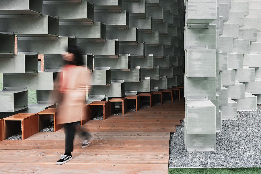 woman walking near wall, person, building, structure, blur, motion HD wallpaper