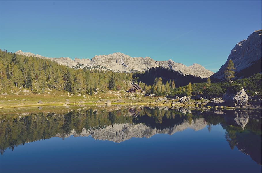 lake, water, reflection, landscape, nature, rocks, boulders HD wallpaper