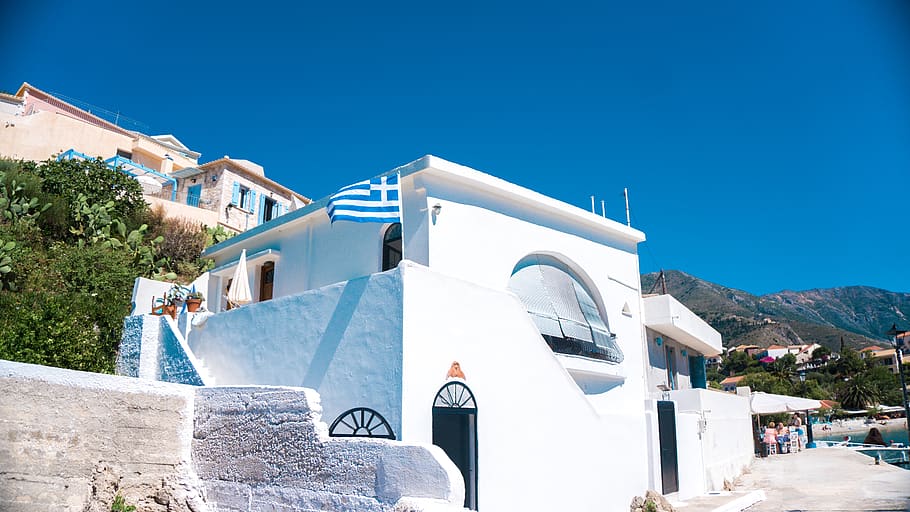 greece, asos, assos beach, sun, building, trees, bay, flag HD wallpaper