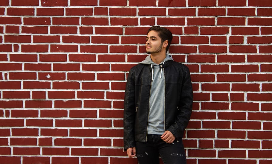 apparel, clothing, brick, wall, coat, jacket, human, person HD wallpaper