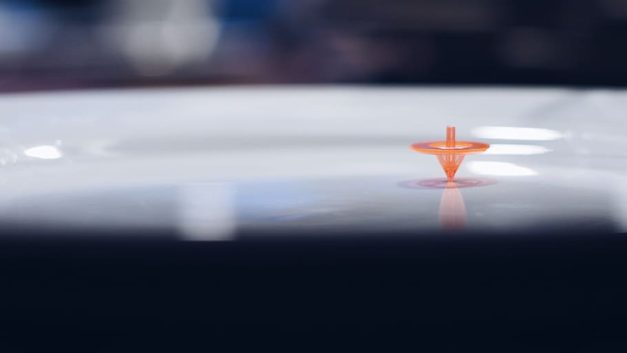 Orange Plastic Toy on White Surface, blur, blurred background HD wallpaper