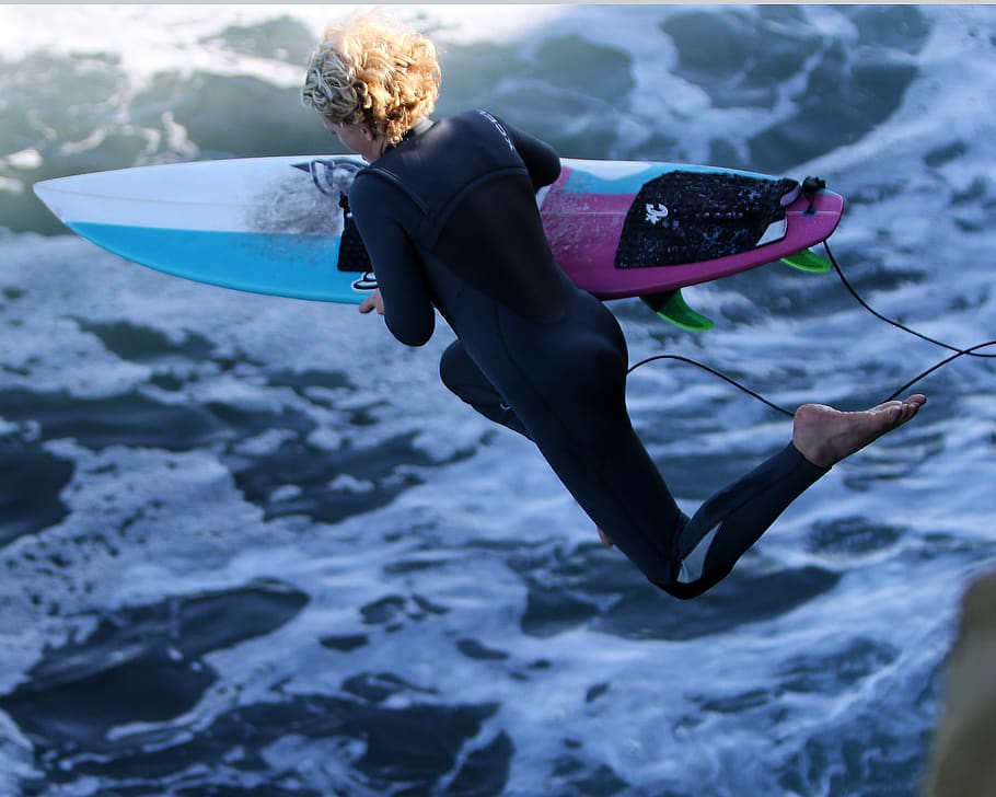 Woman With Surfboard Jumping to Body of Water, action, adult