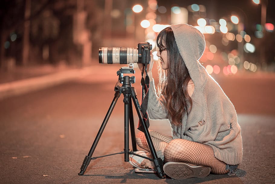 Woman Holding Black Dslr Camera, aperture, camcorder, discovery