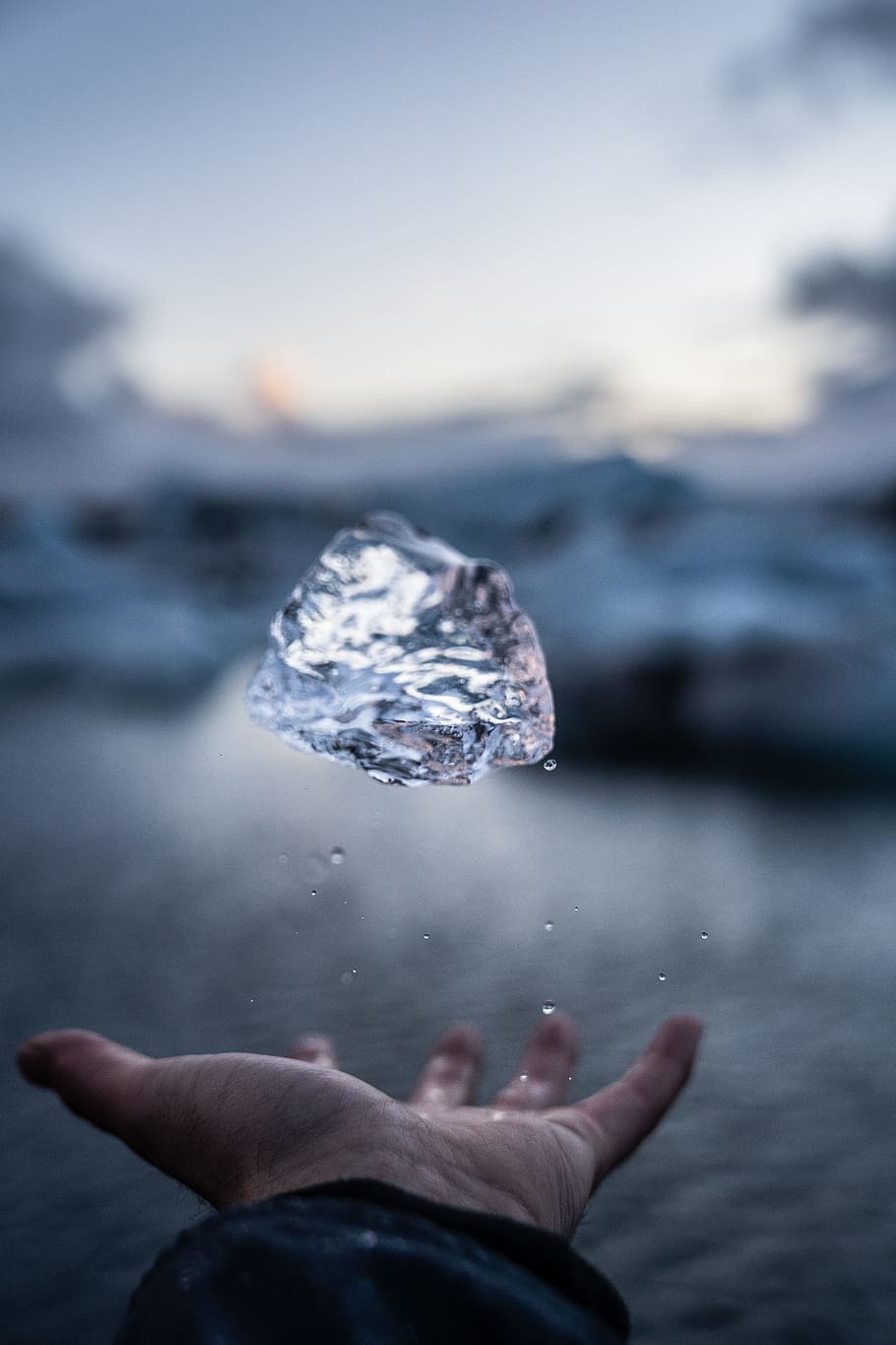 person throwing crystal stone, water, one person, hand, human hand HD wallpaper