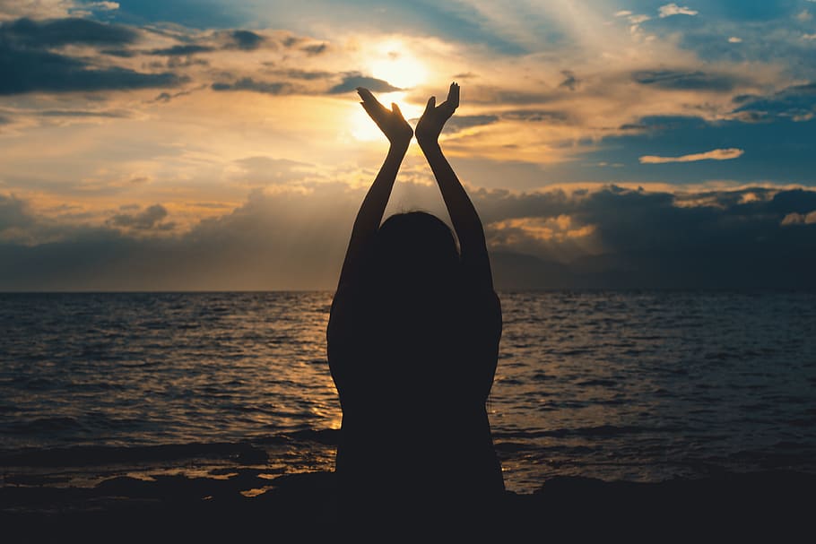 Person Raising Hands Near Sea at Sunset, adventure, backlit, beach HD wallpaper