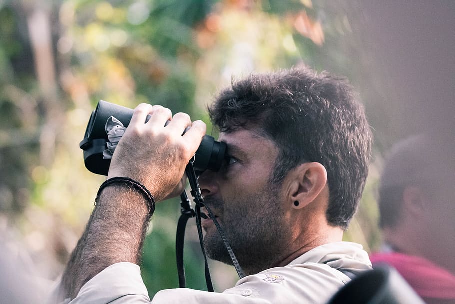 man using black binoculars at daytime, real people, men, photography themes HD wallpaper