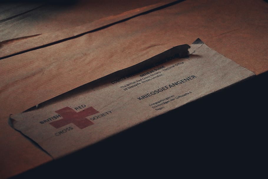 Red Cross logo, text, paper, indoors, wood - material, no people HD wallpaper