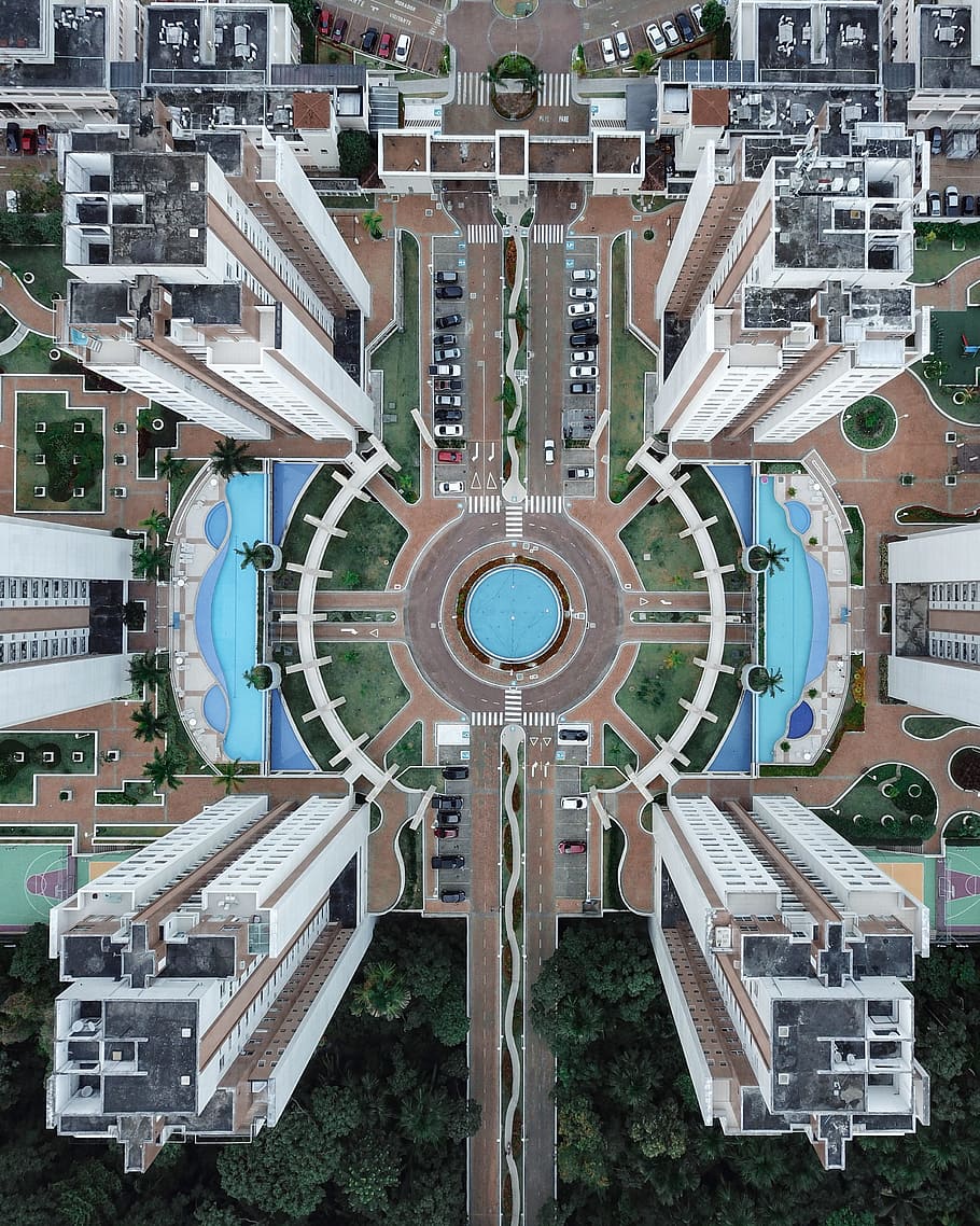 aerial photo of four-building structure, pool, street, road, drone view HD wallpaper