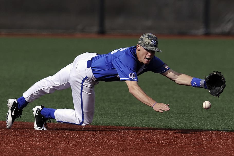 Baseball Player Wearing Blue and White Jersey Catching Baseball HD wallpaper