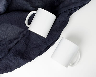 two white ceramic mugs, coffee mug, flatlay, textile, mug mockup HD wallpaper