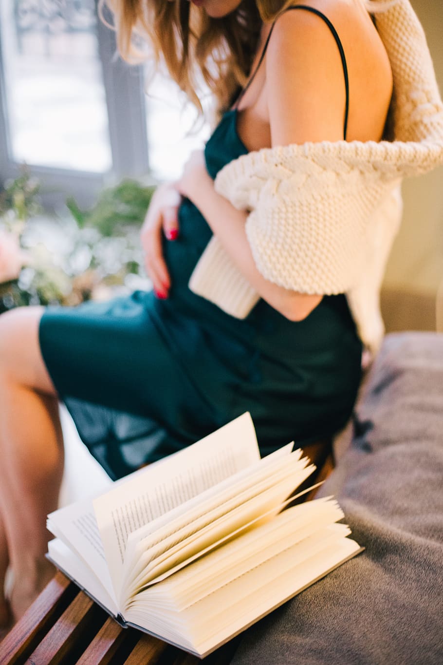 Selective Focus of Pregnant Woman in Black Spaghetti Strap Dress Sitting on Chair Beside Opened Book, HD wallpaper