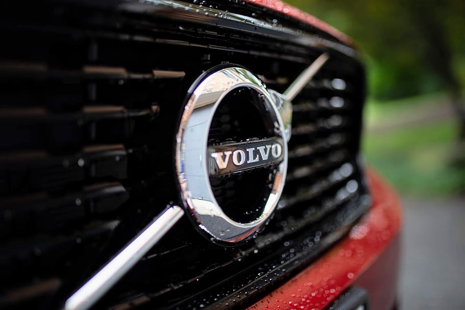 chrome Volvo emblem, vehicle, grill, badge, road trip, rain, wet