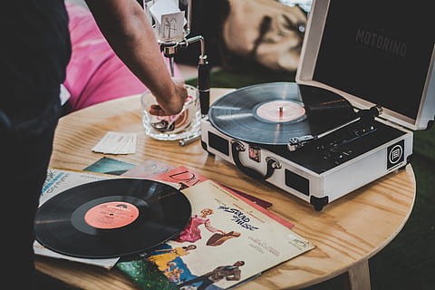 Person Near Vinyl Record Player on Brown Surface, audio, close-up HD wallpaper