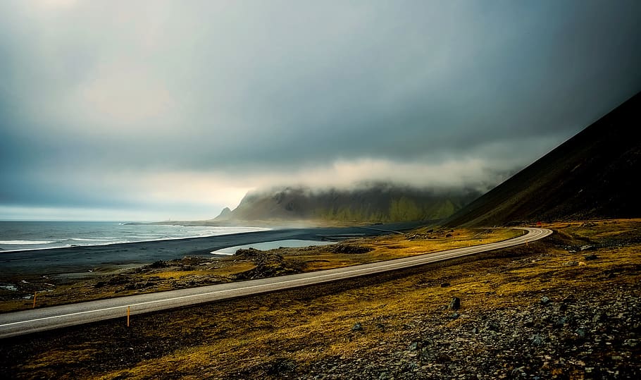 Asphalt Road in Middle of Green Grass Field, beach, beautiful HD wallpaper