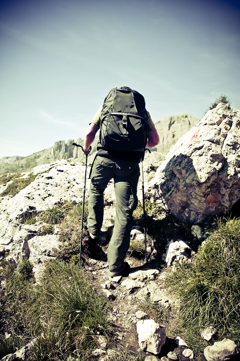 man climbing cliff, person, human, backpack, outdoors, hiking HD wallpaper