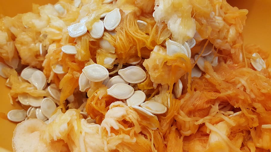 closeup photo of pumpkin seeds, food and drink, yellow, close-up, HD wallpaper