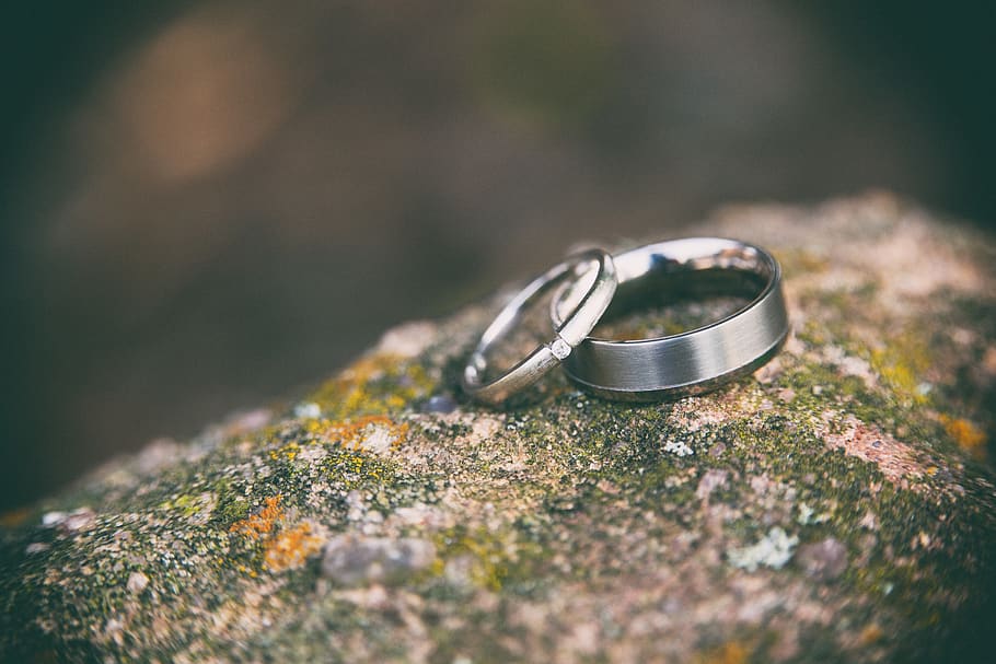two silver-colored rings on stone, jewelry, selective focus, love HD wallpaper