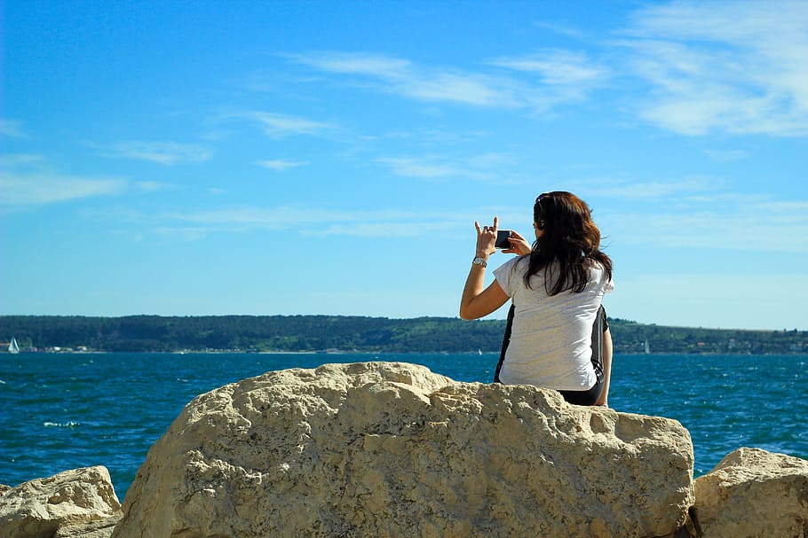 sea, shore, water, sky, blue, people, girl, photographing, smartphone HD wallpaper