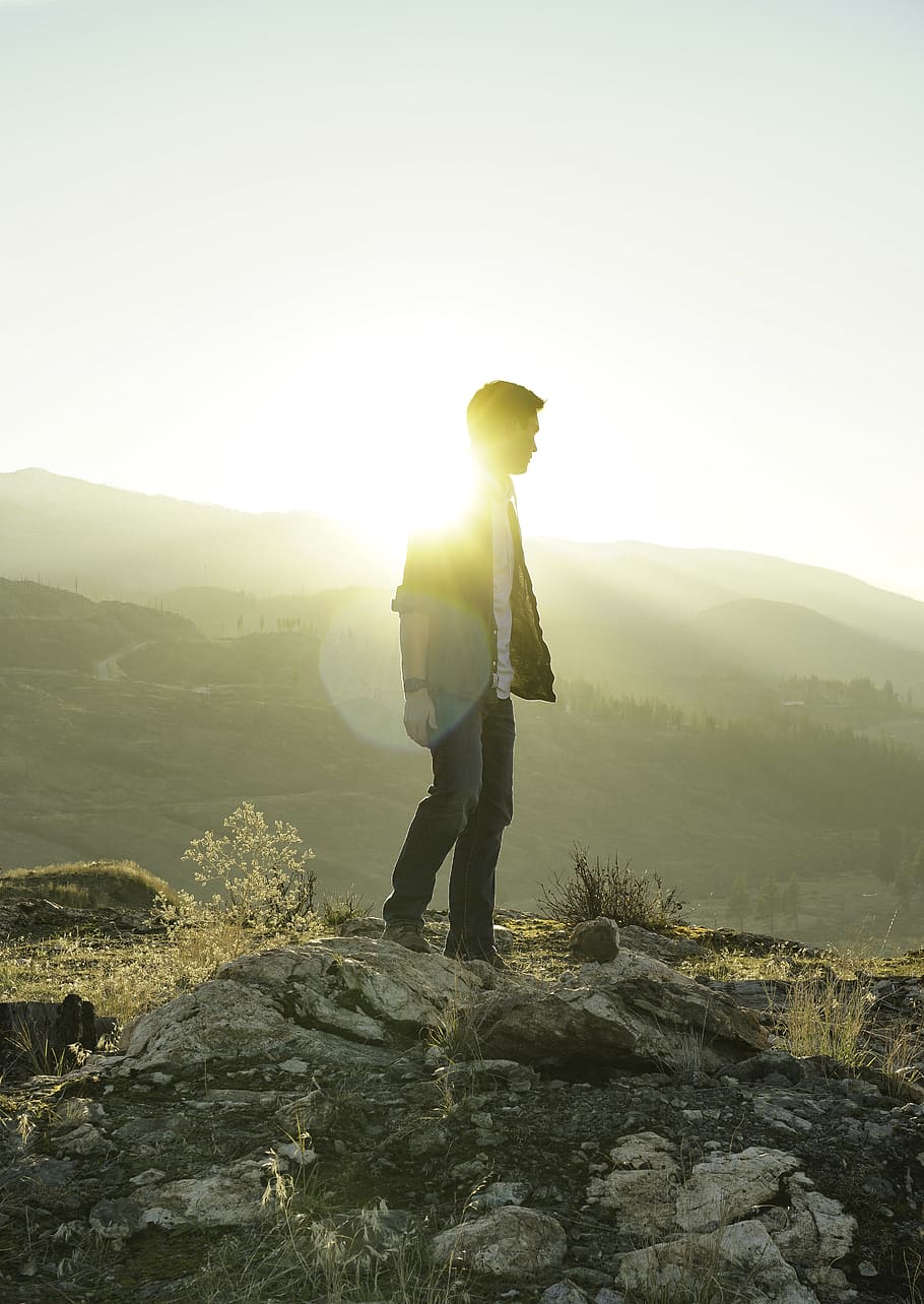 man standing on mountain, flare, light, person, human, nature HD wallpaper
