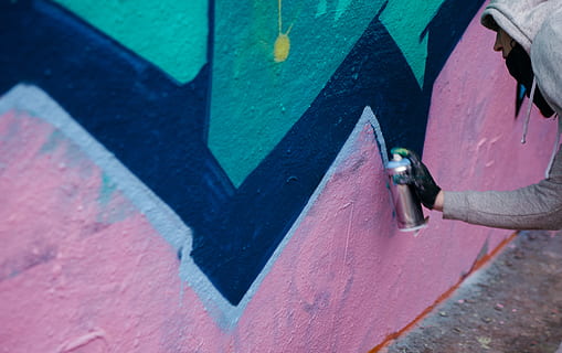 Man Holding Paint Spray Can in Front of Wall, action, art, artistic HD wallpaper