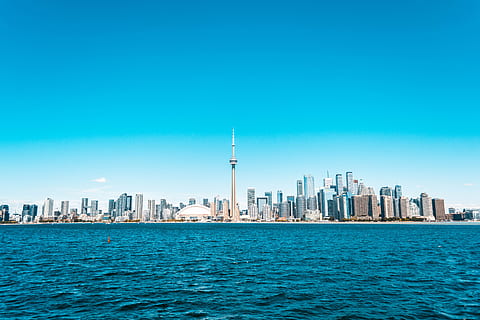 City Buildings Near Sea Under Blue Sky, architectural design HD wallpaper