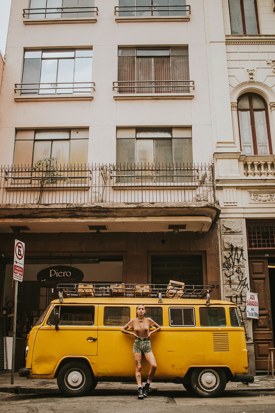 Woman Leaning on Yellow Bus, architecture, asphalt, automobile