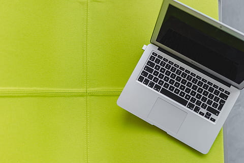 View from above at the laptop on the lime chair, computer, yellow HD wallpaper