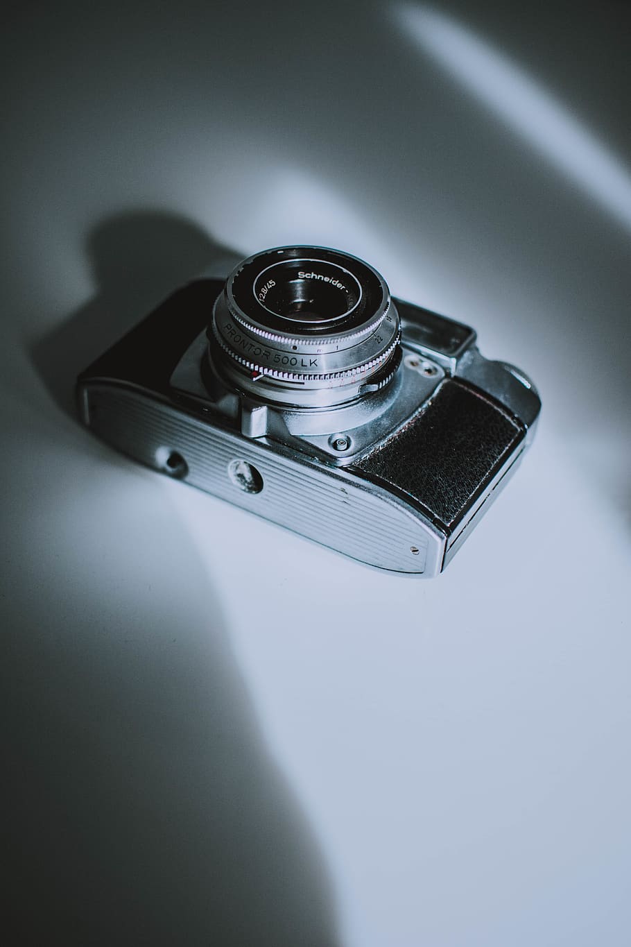 MILC on white surface, electronics, camera, digital camera, camera lens HD wallpaper
