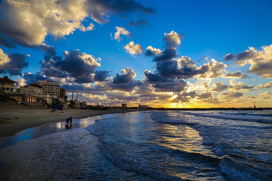 Photography of Seashore During Dusk, beach, buildings, clouds HD wallpaper