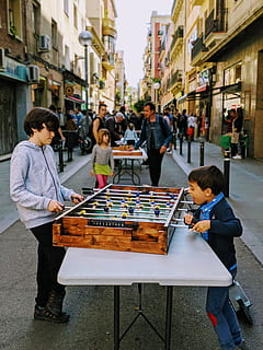 Two Kids Playing On Table, boys, buildings, children, city, commerce HD wallpaper