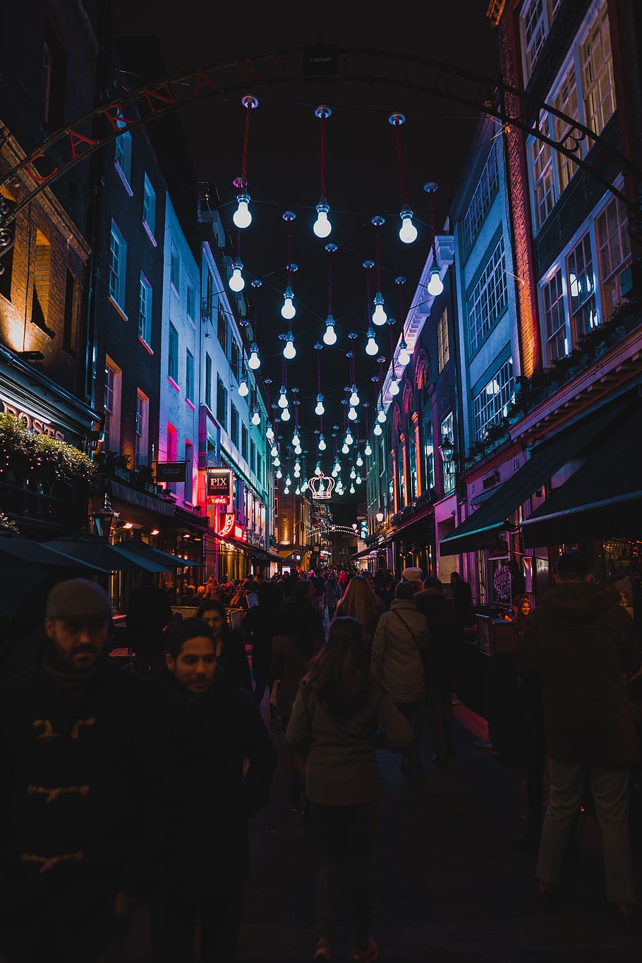 people waking between buildings during night, group of people HD wallpaper
