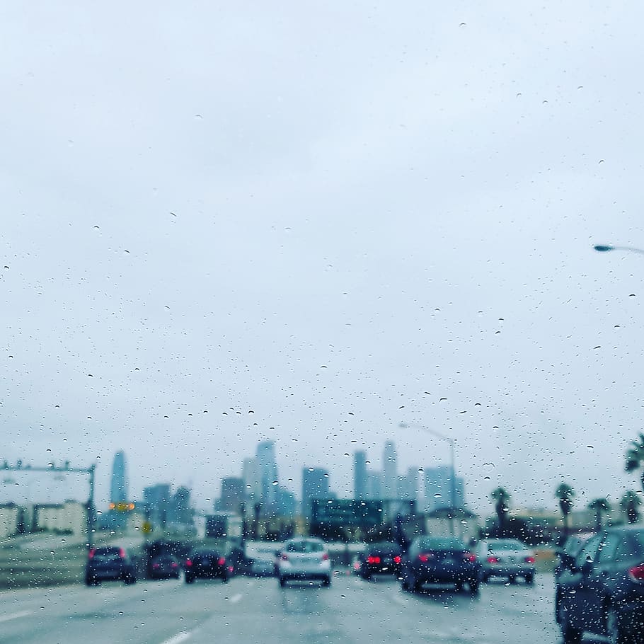 vehicles traveling on road during daytime, sky, wet, city, transportation HD wallpaper